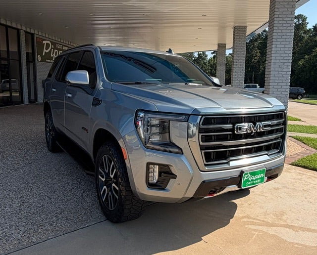 2024 GMC Yukon AT4 in Sterling Metallic — front three-quarter view