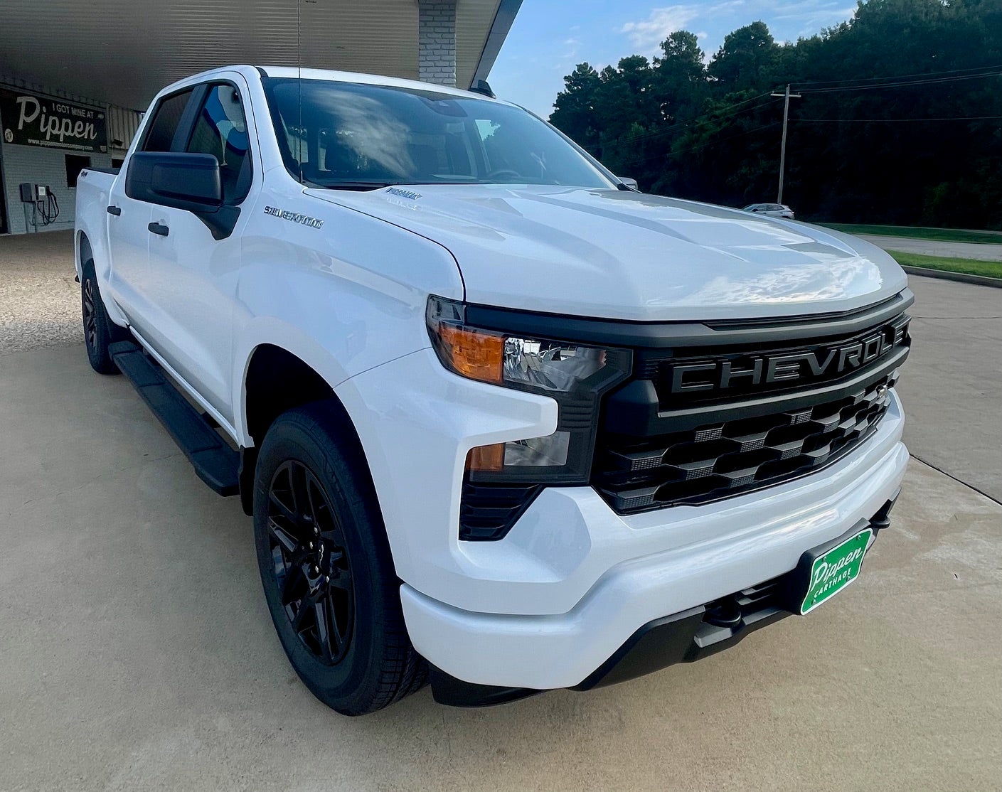 2026 Chevrolet Silverado 1500 Custom in Summit White — front three-quarter view